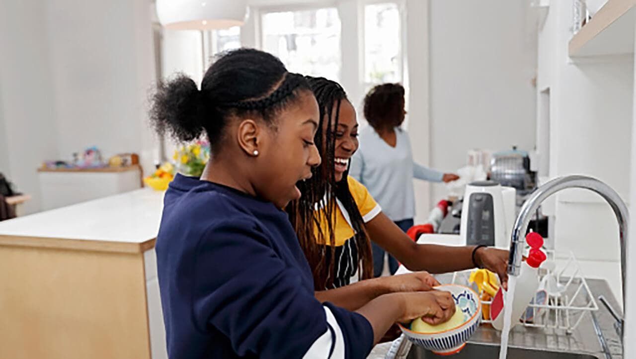 People washing their dishes