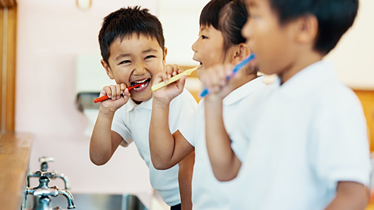 Children brushing their teeth